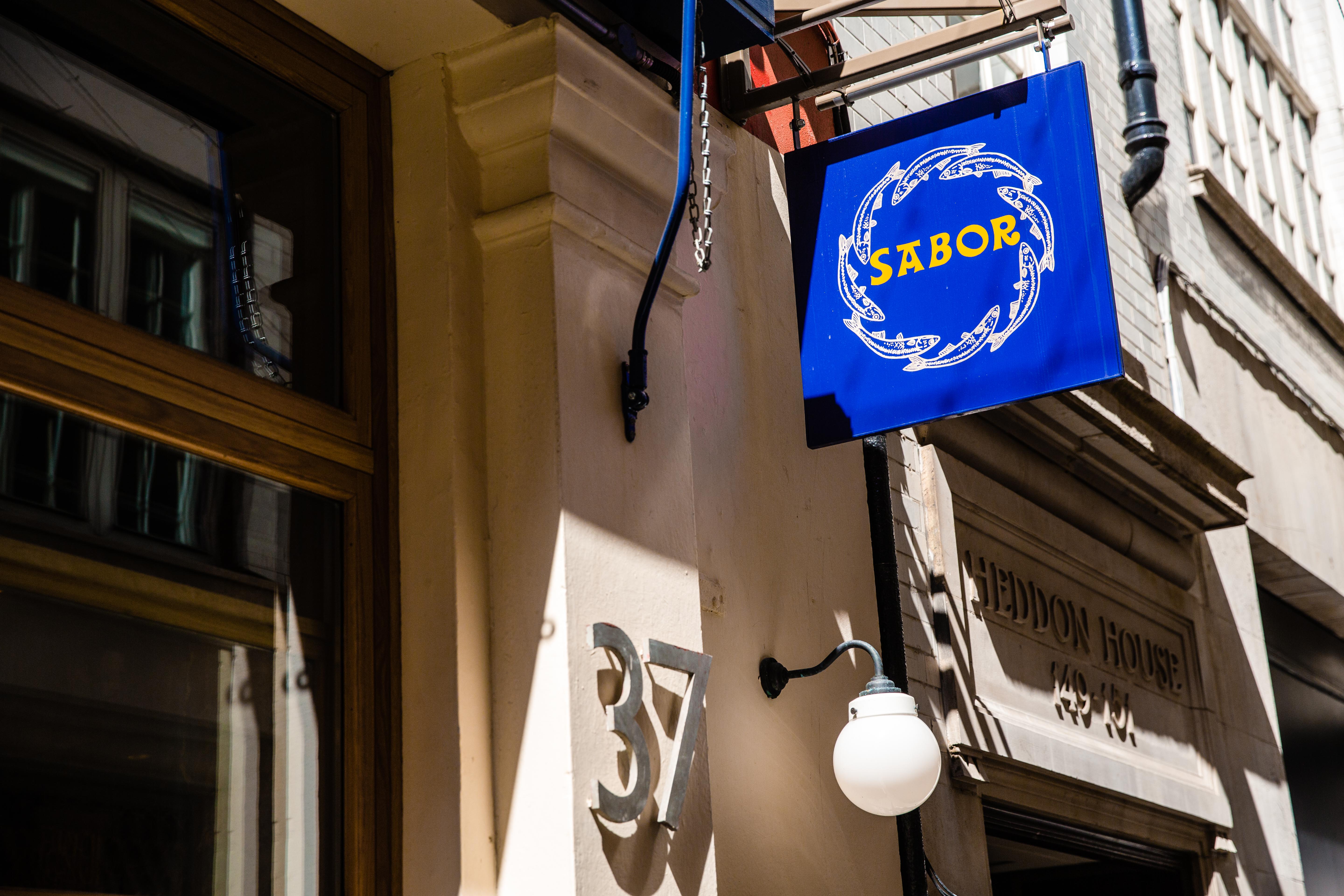 facade of building, sabor restaurant sign
