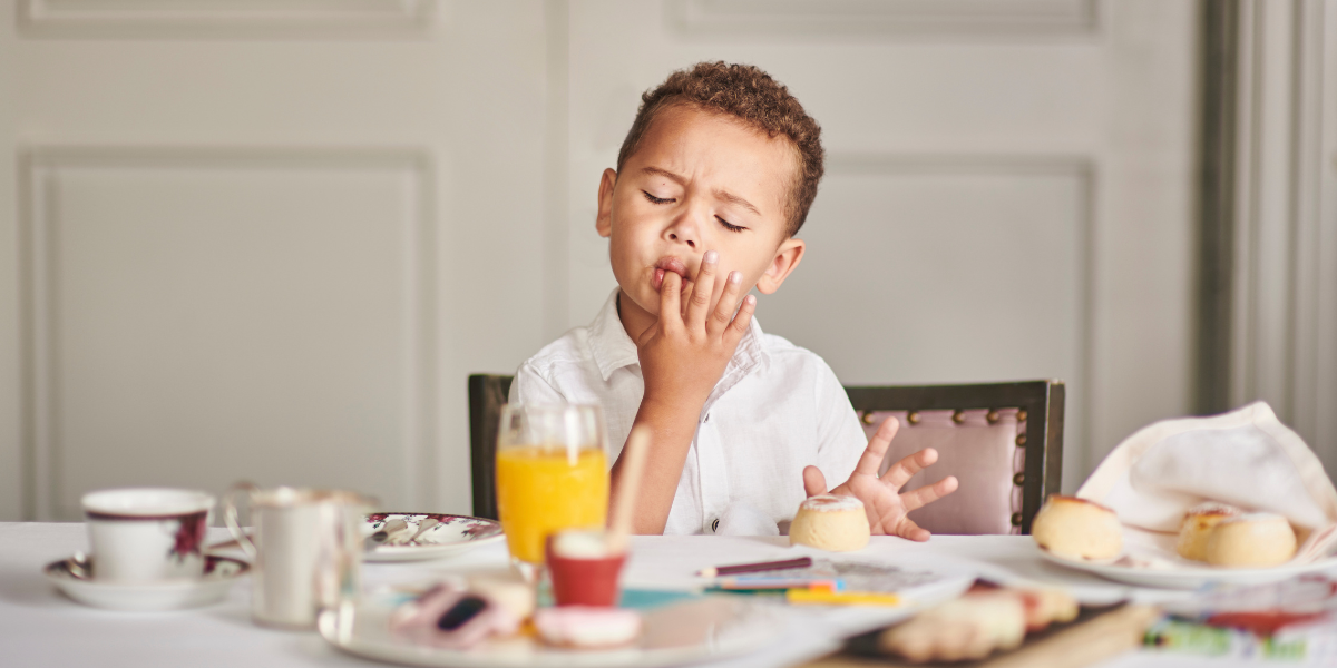 a child enjoying his food