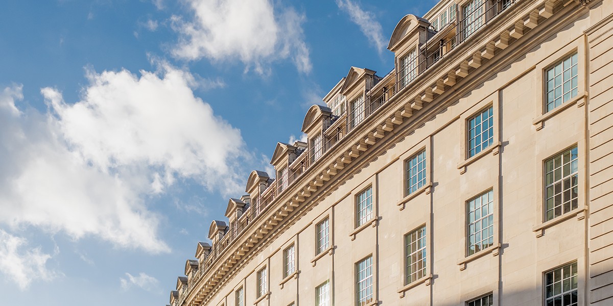 Regent Street curve and clouds in blue sky