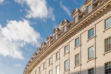 Regent Street curve and clouds in blue sky