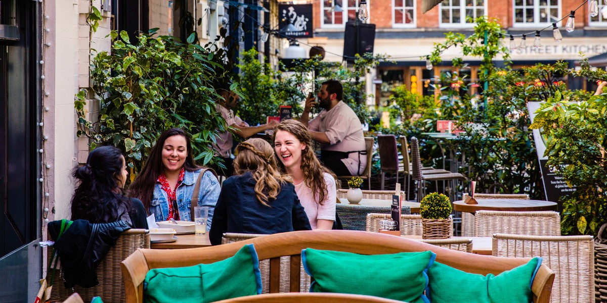 four women dining al fresco on Heddon Street